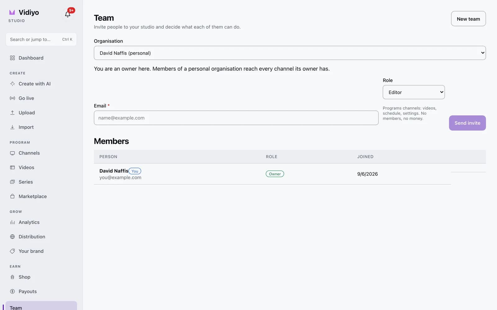 The Team page in Vidiyo Studio with an Organisation picker, an Email field, a Role dropdown set to Editor, a Send invite button, and a Members table.