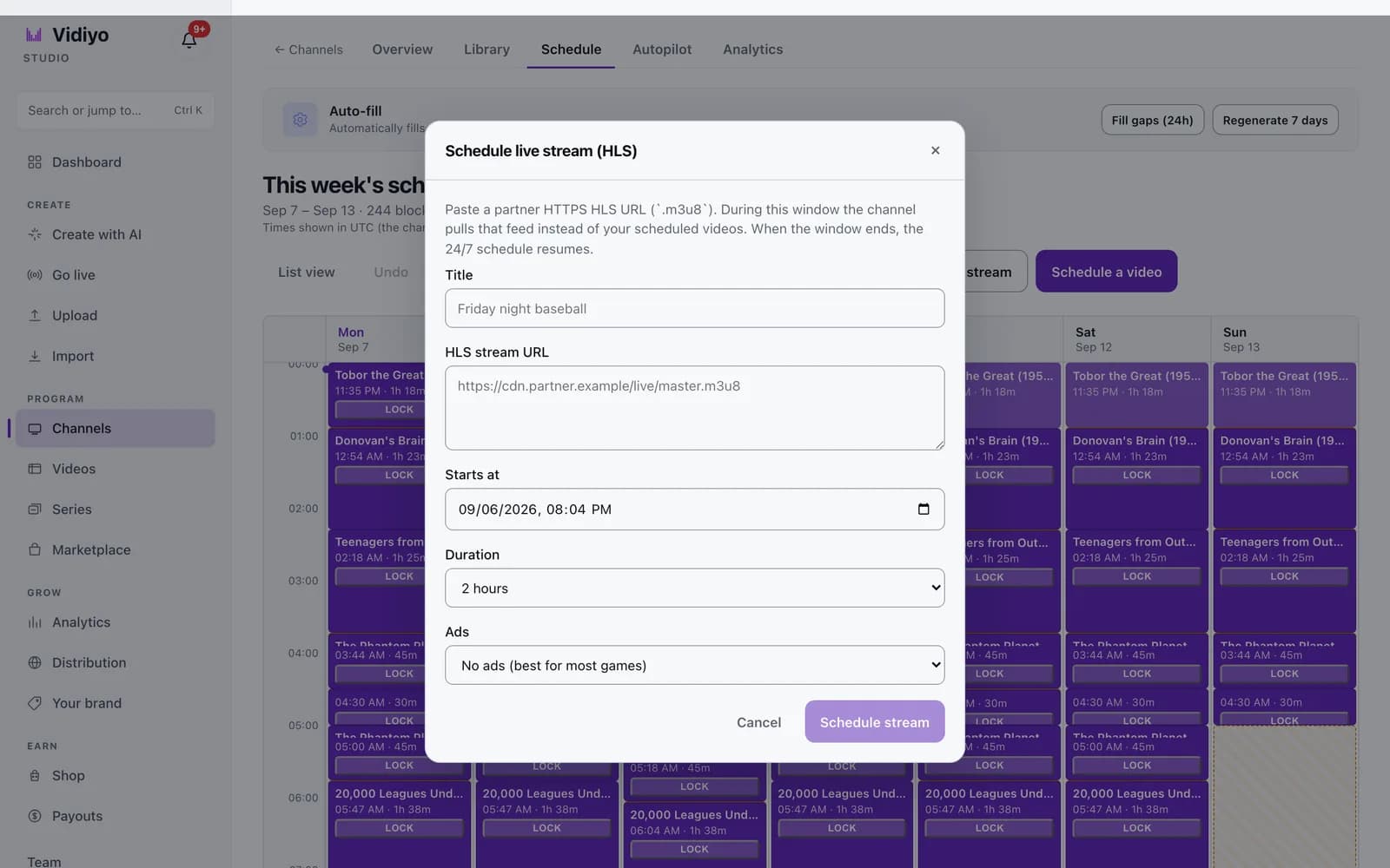 The Schedule live stream (HLS) dialog over a channel's week grid in Vidiyo Studio, with Title, HLS stream URL, Starts at, Duration set to 2 hours, Ads set to No ads (best for most games), and Cancel and Schedule stream buttons.